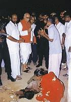 A woman mourns the loss of her son